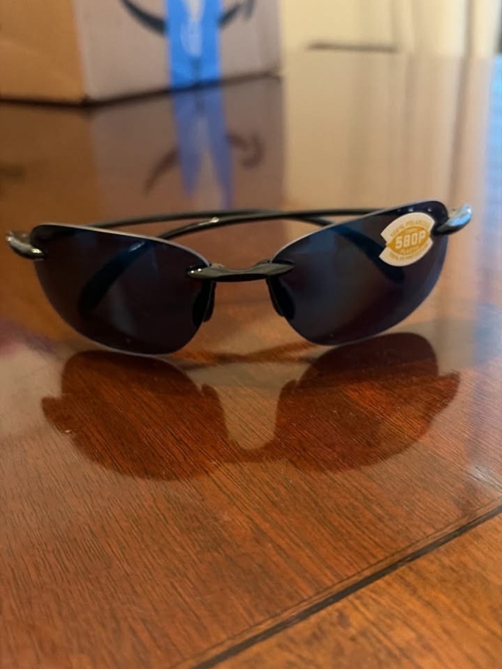 Costa Men’s Black Frame Dark Blue Lenses Polarized Sunglasses